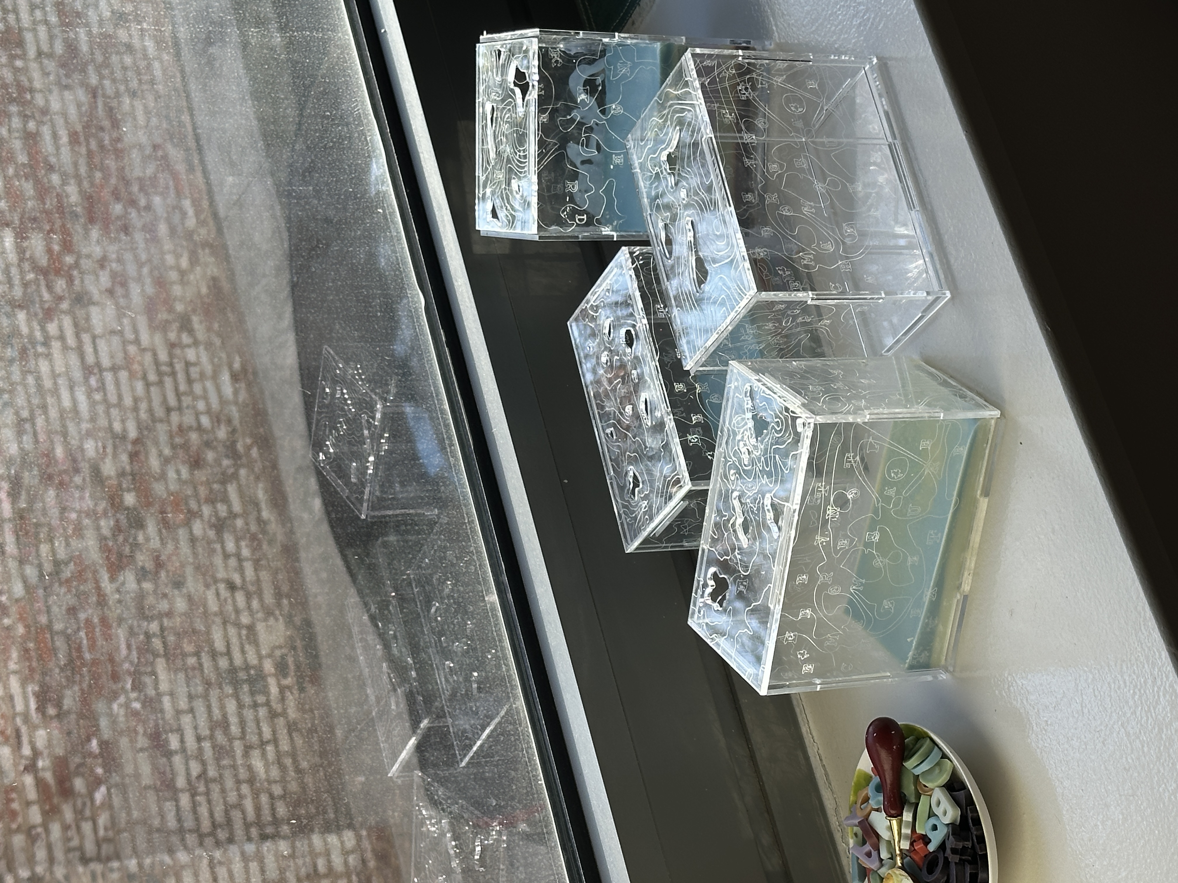 Cognitive Sedimenter
A device invented by a rebel group to record the deposition of ideas over time.
Melting candles simulate the accumulation of layers of thought within the story.
Through audience interaction and the burning of the candles, a chaotic landscape is created.